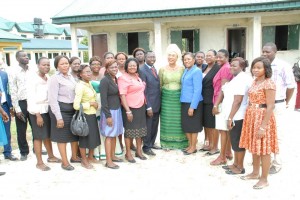 Mrs. Pat Arawore with the Principal, Mr. Emmanuel Oleju and other members of staff, Egbokodo Secondary School